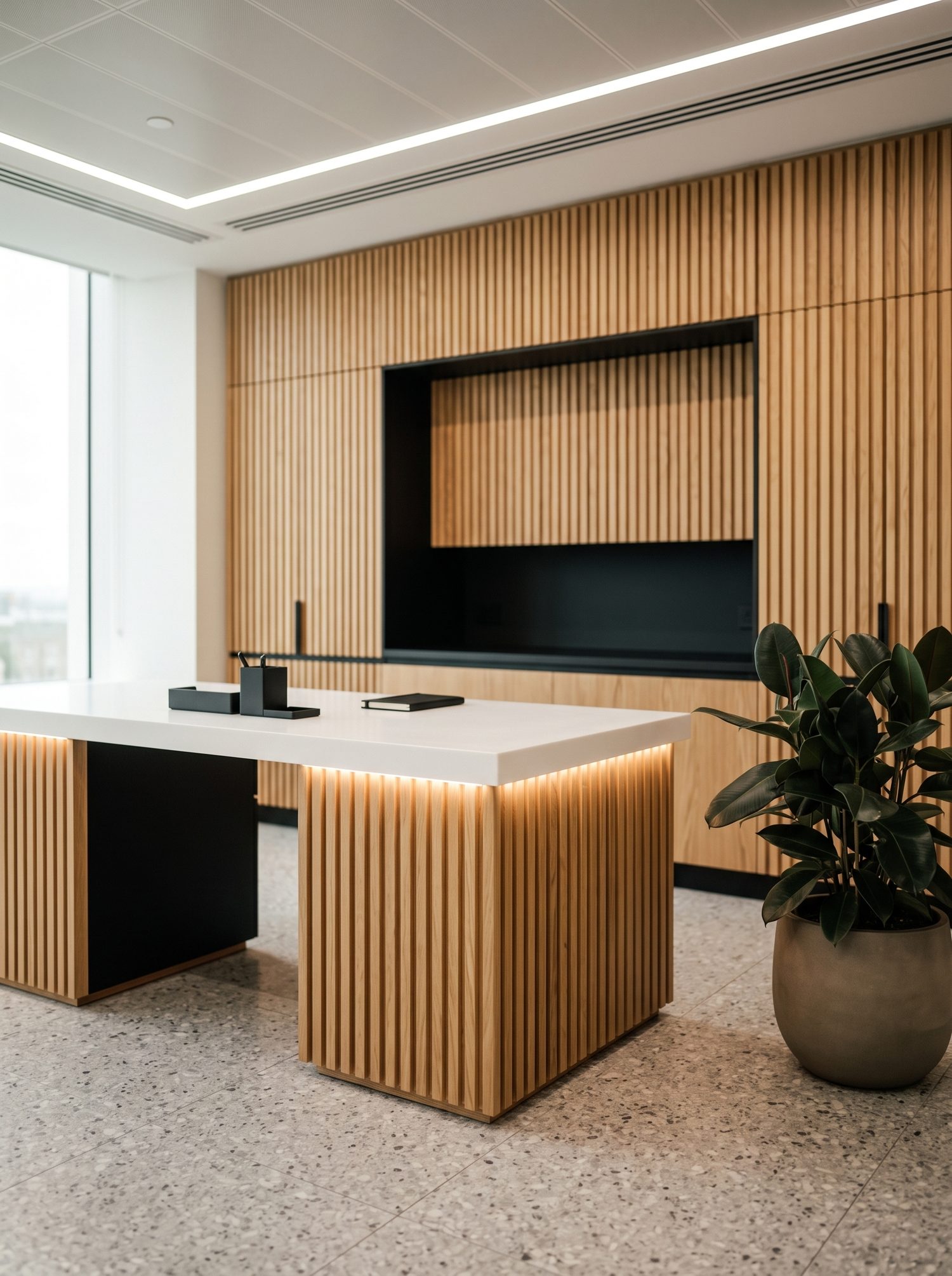 Consultorio con mobiliario de roble y Corian